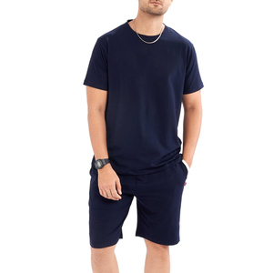Conjunto de dos piezas azul marino para hombre, camiseta de manga corta y pantalones cortos lisos, conjunto informal de verano para uso diario, transpirable - Product Image 1