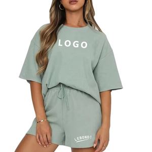 Conjunto de camiseta y pantalones cortos deportivos informales para mujer, colección de verano de media manga con cuello redondo y algodón sólido hasta la rodilla - Product Image 5