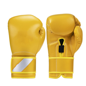 Gants de kick-boxing jaunes en soie antidérapants avec fermeture auto-agrippante pour l'entraînement aux arts martiaux à partir de 14 ans - Product Image 1