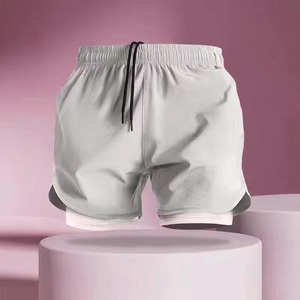 Shorts pour hommes noirs à séchage rapide, taille élastique, couleur unie, décontractés, sportifs, taille mi-haute, en tissu peigné, écologiques et respirants - Product Image 6