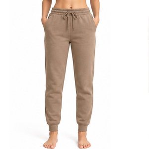 Pantalon de jogging pour femme, très respirant, écologique, avec taille élastique, cordon de serrage réglable, poches latérales et chevilles côtelées - Product Image 1