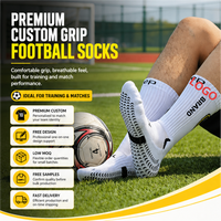 Chaussettes de football personnalisées à forte valeur ajoutée Chaussettes à prise en main d'usine Chaussettes antidérapantes