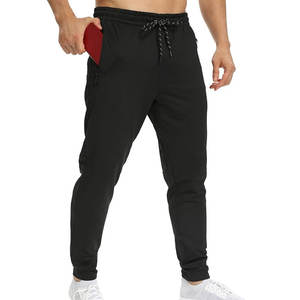 Pantalones deportivos y de chándal premium para hombre, corte ajustado, cintura con cordón, ideales para entrenamiento físico, actividades al aire libre y ropa de descanso. - Product Image 1