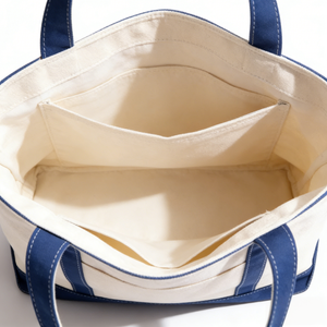 Bolsa de tela de algodón teñida lisa con asas y ribete inferior de colores, lavable y ecológica. - Product Image 2