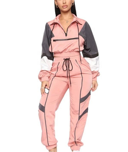 Survêtement femme color block, coupe ample sportive, demi-zip, longueur intégrale, en polyester avec poches latérales, idéal pour le printemps - Product Image 1