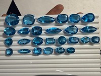 Lot de topazes bleues suisses ovales et taille coussin facettées pour la fabrication de bijoux chez BU GEMS, 100 % naturelles, certifiées par un tiers