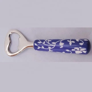 Abrebotellas de resina chapada en plata, mango de marfil - Product Image 3