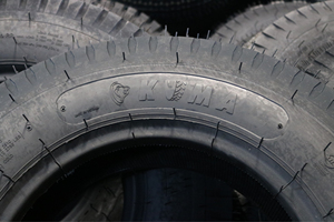 Neumático KUMATIRE K724 12.00-24 24PR OTR de Vietnam para trabajo pesado fuera de carretera, para cargadoras, motoniveladoras y minería, precio competitivo. - Product Image 4