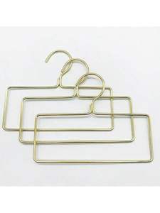 Organisateur de placard en laiton pour un rangement efficace des vêtements et une gestion optimale de l'espace - Product Image 2