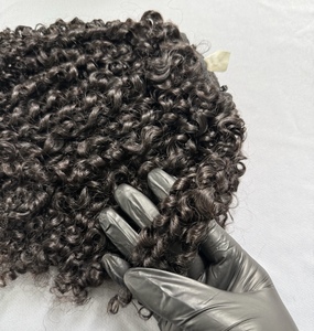 Vente en gros de extensions de cheveux bouclés pixie humain vietnamien à double dessin et aligné sur les cuticules, bon marché, livraison dans le monde entier - Product Image 1