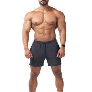 Shorts pour hommes à taille élastique, couleur unie, séchage rapide, décontractés, taille mi-haute, en tissu polyester tricoté - Product Image 1