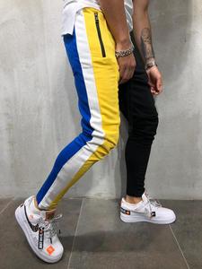 กางเกงกีฬาผู้ชายทรงสลิมฟิต ฮิปฮอป สำหรับออกกำลังกาย วิ่ง หรือเล่นกีฬา ขายส่ง - Product Image 6