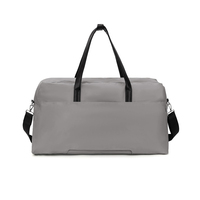 Sac de voyage de luxe moderne avec logo imprimé, en polyester, nylon et PVC, grande capacité, imperméable, avec poignée en cuir, pour homme et femme