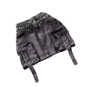 Tendance 2026 HSI Jupe en denim semi-extensible, modèle haut et bas fantaisie, avec ceinture cargo classique et multiples poches, style chic - Product Image 1