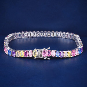 A colorful tennis custom diamond unisex <b>bracelet</b> custom piece Lab grown diamonds 14kt solid white gold Oval cut colorful diamond - Product Image 1