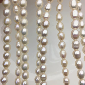 Perlas de Agua Dulce AA Blancas Perla de Arroz Ovaladas 6-10mm Naturales Cultivadas Sueltas en Hilo para Suministros de Joyería a Granel - Product Image 1