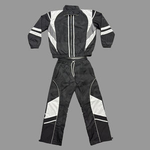 Chándal Cortavientos al por Mayor, Pantalón y Chaqueta 100% Nailon con Líneas Reflectantes, Diseño Más Reciente, Chándal Cortavientos para Hombre - Product Image 1