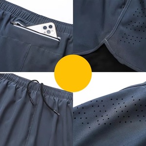 Shorts de sport pour homme, couleur unie, séchage rapide, avec poches, taille élastique, longueur mi-cuisse, en spandex et polyester, vert et noir - Product Image 5