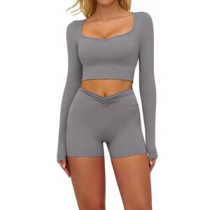 Conjunto Deportivo Seamless para Mujer al por Mayor Personalizado: Top Corto de Manga Corta y Shorts de Ciclismo Acanalados de Cintura Alta para Correr - Product Image 1