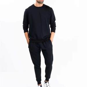 Conjunto Deportivo Informal para Hombre, Sudadera de Manga Larga con Cuello Redondo y Pantalones Deportivos con Cintura Elástica, Color Negro Sólido - Product Image 1