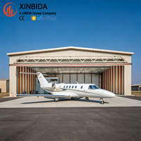Structure de hangar robuste à ossature métallique, grande portée, pour stockage aéronautique, maintenance d'avions, stationnement de jets privés, utilisation aéroportuaire