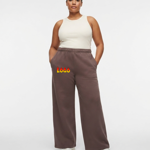 Pantalones de chándal de cintura alta y pierna ancha para mujer, de color liso, con cintura elástica, ajuste holgado informal, de largo completo, de alta demanda, del fabricante. - Product Image 1