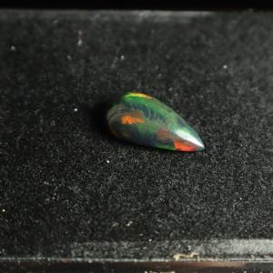 โอปอลสีดำธรรมชาติทรงลูกแพร์ขนาด 3.75 กะรัต ขัดเงา ลายรังผึ้งขนาดเล็ก 17x10 มม. พลอยเม็ดเดี่ยว - Product Image 1