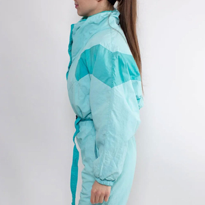Combinaison de ski pour femme, bleu clair, à blocs de couleur, avec col montant et taille ceinturée, imperméable, une pièce, pour la neige - Product Image 4