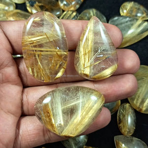 พลอยทับทิมธรรมชาติสีทองทรงหลังเบี้ยทรงผสมและขนาดต่างๆการรักษาขายส่งอัญมณีอัญมณีสำหรับทำเครื่องประดับ - Product Image 1