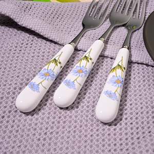Ensemble de 4 petites fourchettes en métal en acier inoxydable avec motif marguerites en céramique pour restaurant, fruits, desserts, et service festif d'Halloween - Product Image 1