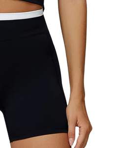 ชุดออกกำลังกายสำหรับผู้หญิง เสื้อชั้นในกีฬาไร้ตะเข็บและกางเกงขาสั้นเอวสูง สีดำขาว เนื้อผ้านุ่ม ยืดหยุ่น ระบายอากาศได้ดี เหมาะสำหรับออกกำลังกายและฟิตเนส - Product Image 6