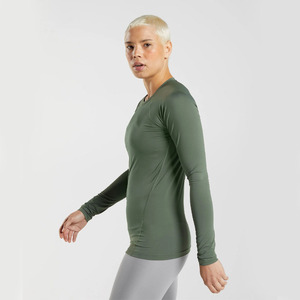 Haut de yoga tendance pour femme à manches longues et col rond, couleur unie, respirant, compressif, coupe régulière, pour entraînement sportif - Product Image 5