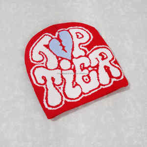 Gorro de calavera de punto con logotipo de Jacquard de invierno personalizado para hombre, gorro con estampado cálido para viajes y ropa de playa - Product Image 1