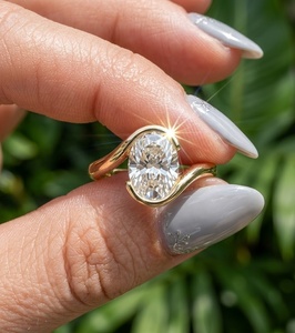 แหวนเพชรทรงรี 1.50 กะรัต รับรองโดย IGI แหวนหมั้นคลาสสิกทองคำแท้ 14K แบบ Bypass Half Bezel Solitaire แหวนแต่งงานสั่งทำพิเศษ - Product Image 1