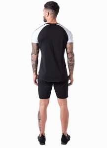 T-shirt homme noir et blanc à manches raglan, épaules contrastées, coupe slim, manches courtes, col rond, style décontracté et sportif - Product Image 2