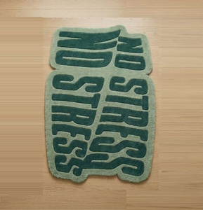 Alfombra de Lana de Lujo con Diseño Geométrico Verde y Tipografía, Hecha a Mano, de Alta Demanda y Superventas para Decoración Moderna del Hogar - Product Image 1