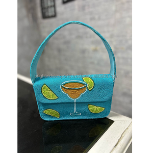 Bolso de mano de cóctel bordado en turquesa con diseño de limón y martini para fiesta nocturna - Product Image 1