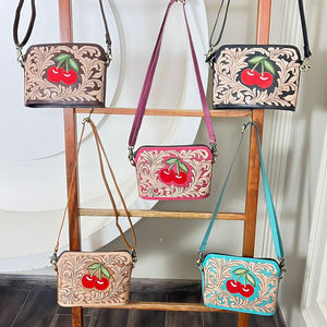 Bolsos de mano de diseño con motivos florales en relieve color rosa de moda, bolsos cruzados de cuero genuino estilo occidental para damas. - Product Image 3