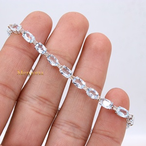 Pulsera de tenis de oro blanco macizo de 14K con aguamarina natural ovalada y diamantes engastados, joyería fina, Memoria Jewels, venta al por mayor - Product Image 1