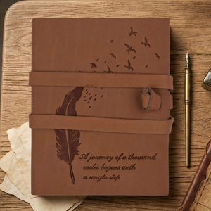 Journal artisanal vintage A5 avec plumes |   Carnet de notes écologique avec fermeture à cordon, couverture gravée rustique, journal cadeau A5 - Product Image 1