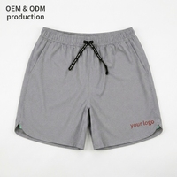 Shorts décontractés pour hommes en polyester gris uni, taille élastique avec cordon de serrage, séchage rapide, respirant, logo frontal, 7 pouces, pour l'été et le sport