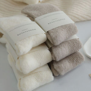 Chaussettes de nuit douces et confortables en cachemire de haute qualité pour femmes, avec revers tricotés épais et chauds pour l'hiver, pour adultes, personnalisables avec votre marque. - Product Image 1