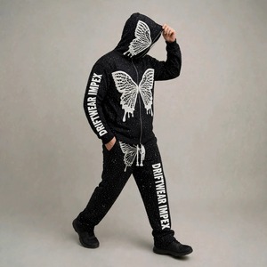 DRIFTWEAR IMPEX Survêtement tricoté surdimensionné à imprimé papillon en relief - Hoodie zippé streetwear hip-hop orné de strass et joggers superposés - Product Image 1