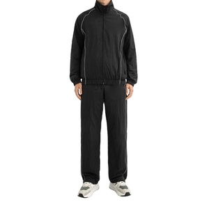 ชุดวอร์มเทคฟลีซผู้ชาย ผ้าไนลอนกันลม แต่งแถบสะท้อนแสง ปักโลโก้ - Product Image 2