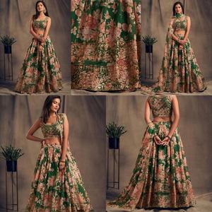 DESIGNER SOFT ORGANZA AVEC IMPRESSION NUMÉRIQUE AVEC BRODERIE LOURDE SEQUENCE JARI WORK LEHENGA CHOLI AVEC DUPATTA GREEN - Product Image 1
