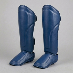 Protège-tibias bleus en PU, élastiques et ajustables avec fermeture auto-agrippante, équipement de protection pour la boxe, unisexe pour adultes, couleur unie - Product Image 1