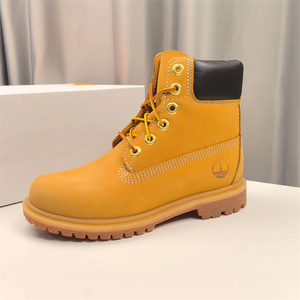 Botas de Tobillo con Cordones de Alta Calidad, Personalizadas, de Moda, para Hombre y Mujer, de Cuero Genuino, Impermeables, Estilo Clásico de Invierno, Color Amarillo - Product Image 1