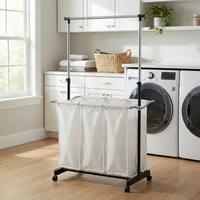 Organisateur de vêtements multifonctionnel avec panier à linge à 3 compartiments et porte-vêtements pour la salle de bain