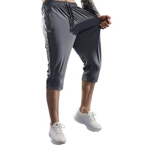 Pantalon de survêtement capri pour homme, violet, taille élastiquée avec cordon de serrage, séchage rapide, tissu satiné, couleur unie, style sportif, taille mi-haute avec poches zippées - Product Image 4