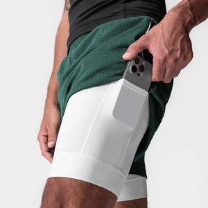 Shorts de sport 2-en-1 vert foncé à séchage rapide avec logo personnalisé, maille respirante, pour basketball, course et gym, 5 pouces, avec poches latérales zippées - Product Image 4